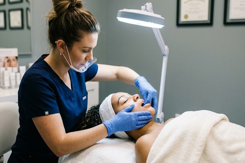 Perform buccal massage technique during facial therapy